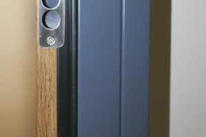 acabado bicolor RAL PVC puerta metálica batiente andreu
